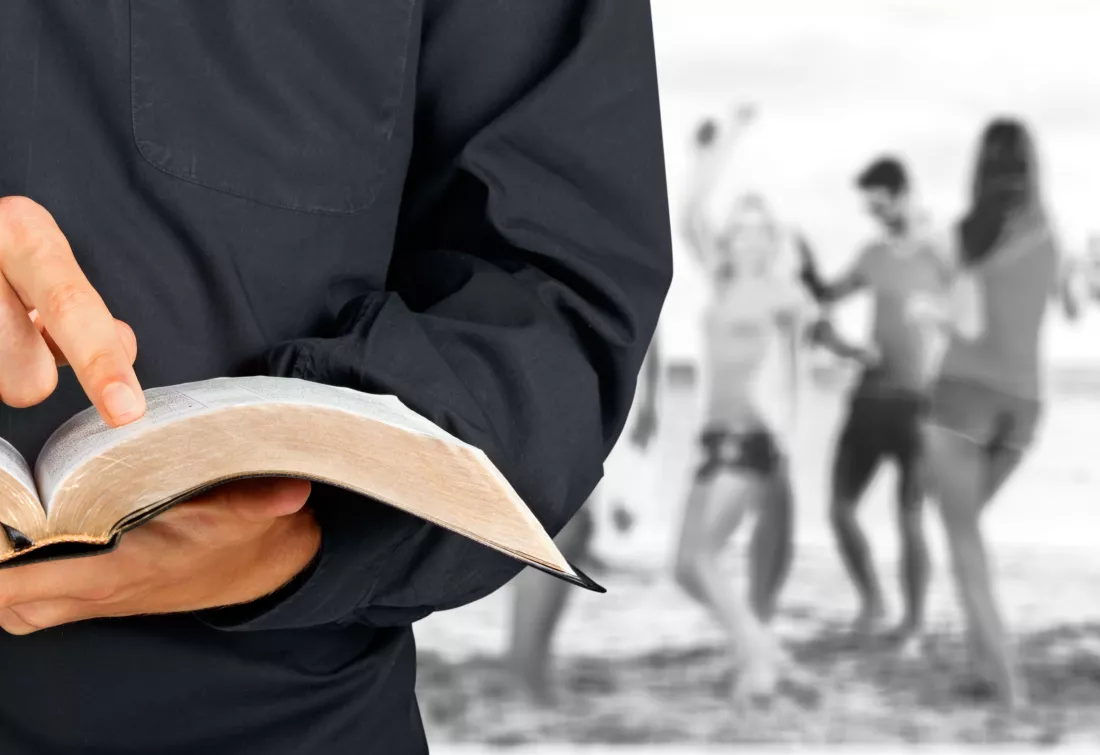 man-reading-old-heavy-book-background